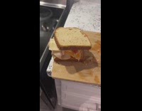 Man guarding his sandwich