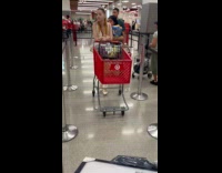 Woman with bag full of parakeet birds