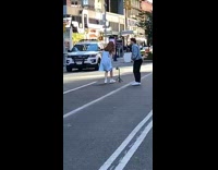 Man and woman danced in the middle of the street