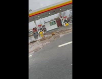 Gas station flooded with water 