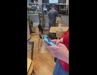 Man photographer coffee cup restaurant photo shoot