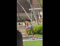 Woman dances at resort for video 