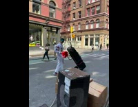 Guy in white plays music over loud speakers Part 1 