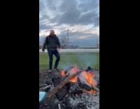 Man jump over burning logs wood fails