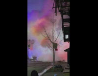 White smoke comes out of side of building