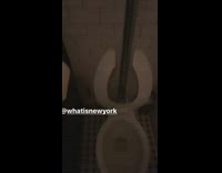 A very tall toilet tank and a low toilet bowl