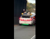 Ghostbusters customized car drive on highway traffic