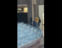 Guy wears darth vader costume gas mask 