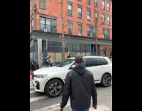 Man wears trojan costume photoshoot on street