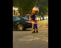 Collab winy - Black lamborghini and nyisles mascot on street