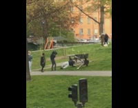 Couple plank workout video park traffic signal