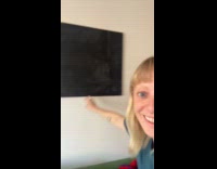 Woman painted canvas looking like tv