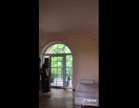 Two girls dance black graduation gowns 