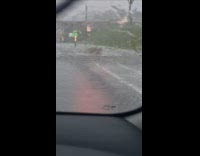 Water overflowing from sewer because of storm