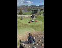 Man stands and dances on the kids playground