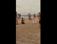 Woman white pants pose at beach party