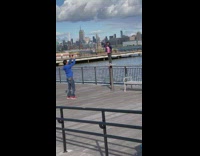 Little girl danced on top of the dock table