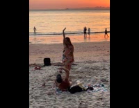 Woman dress tiktok dance beach at sunset