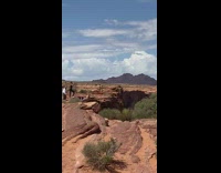 Woman violet yoga pants lay down rock