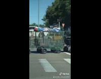 Homeless electric scooter train cross street