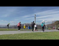 Seven men mask group dance park music