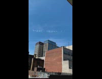 Collab WINY - Skywriting in progress we salute essential  