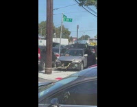 Man broke his car at the park at day