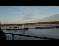 White towboat boat red blue container river