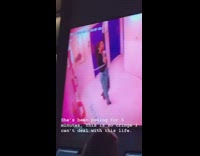 Girl poses for five minutes outside bathroom 