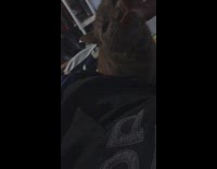 Guy in bed feeds cat doritos chip 