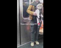 Collab WINY - Man in train carry dog on front