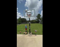 Kid Shoots Ball from Behind the Ring