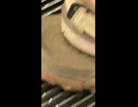 Person on escalator overgrown toenails brown sandals 