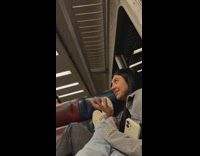 Girl lights turn off in train