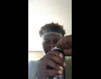 Guy opens monster energy drink can sprays self in eyes