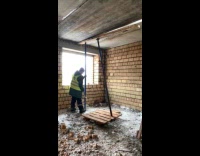 Man hit by support pole inside building