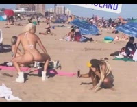 Woman g string twerk on beach