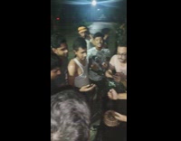 Birthday cake smashed by friends on motorcycle