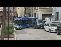 Blue bus cant turn block the road
