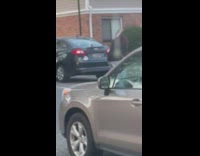 Dancer Films Video in Parking Lot with Car as Tripod 