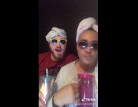 Couple lip sync duet towel turban sunglasses 