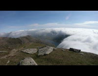 Time lapse video of clouds that covers the mountains