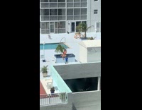 Young boy mom bikini small tree pool