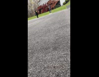 Girl rastafarian shirt dance front yard