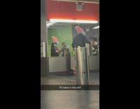 Woman hold fan dance inside gym mirror