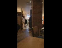 Two women pictorial restaurant staff talk face mask