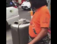 Orange shirt guy dances sidewalk girl laughs 