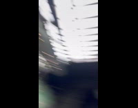 Girl eats sandwich while on water ride