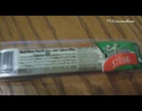 Beagle dog eats two bagels string cheese 