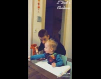 Dad serves fancy chocolate milk to baby